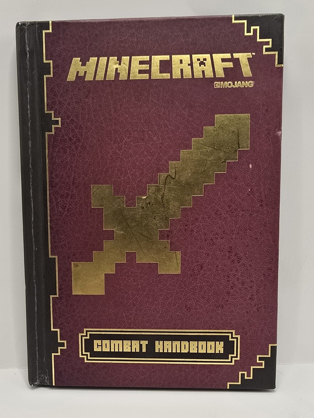 Minecraft: Combat Handbook Hard Back Book